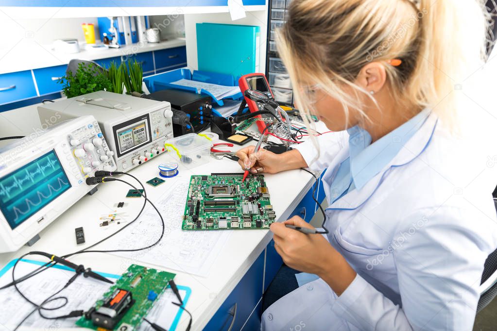 Engineer performing functional tests on an industrial prototype