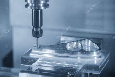 Precision-machined aerospace metal components on an inspection table